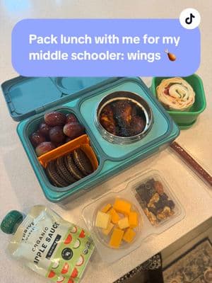 Pack lunch with me for my middle schooler. Today he is having chicken wings, with grapes, deli pinwheel, and some extra snacks.  ##kidssnacks##packlunchwithme##kidslunchideas##lunchideas##lunchpacking##lunchpackingmom##kidslunch##sahmlife##middleschoollunch##middleschool##omielunch##omiebox