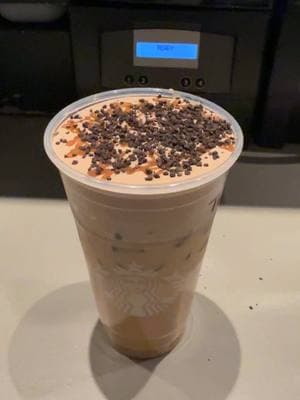 Starbucks Secret Menu Twix Latte made with oat milk, 3 pumps dark caramel, chocolate cold foam, caramel drizzle and cookie crumble topping🍫.  #starbucks #secretmenu #fyp #foryou #new #secret #viral #starbucksbarista #starbucksrecipe #starbuckshack #starbuckssecretmenupro #Love #twix #candy #try #delicious 