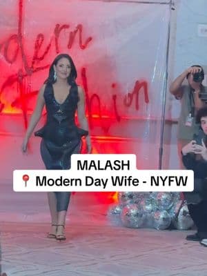 Made 𝙛𝙤𝙧 and 𝙗𝙮 a QUEEN! So when Ashley, the Lead Designer and Founder of @malash.dgns, asked me to walk NYFW for her I hardly felt worthy, but sometimes all it takes is another Queen adjusting your crown to remind you yours still fits. ✨  MALASH creates custom pieces designed with boldness, uniqueness, and a sense of vogue. A woman-owned and operated brand, MALASH adds a touch of couture to your wardrobe. You can contact Ashley for a consultation - she’s a true gem.  👗 The ‘Emerald Sharp’ Dress by MALASH  📍 ‘Meet Me In New York’ Modern Day Wife  @interconbarclay #fashiontiktok #fashionweek #customdress #newdesigner #crocodileleather #fauxleather #paneldress #newyorkfashionweek