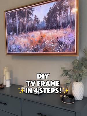 Four Steps to a DIY Framed TV! 🎬✨ This is one of those projects I kept putting off, thinking it wouldn’t make much of a difference… but WOW, was I wrong! The frame completely softens the look of the TV and gives it a custom, built-in feel—all with just a few simple steps. Here’s what I did: 1️⃣ Cut ornamental molding with a miter saw (or use miter shears for a tool-free option!). 2️⃣ Hot glued the corners together. 3️⃣ Used antique gold Rub ‘n Buff for that vintage charm. 4️⃣ Attached it with hot glue to each corner of the TV—easy to remove if needed! Such a quick DIY with a BIG impact!  Want the full supply list? Linked in my LTK in bio! #DIYHome #BudgetFriendlyDIY #TVFrame #HomeDecorOnABudget #DIYProjects #EasyHomeUpgrades #BeforeAndAfter