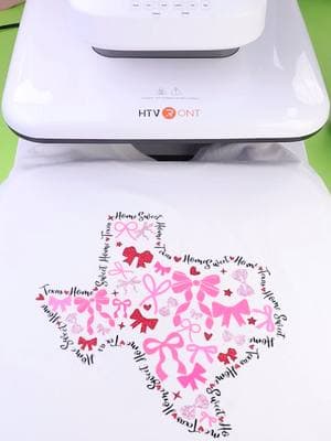 🎀Get creative by using different colored vinyl scraps to design unique bow decals! Simply place them randomly on your T-shirt and heat press for a one-of-a-kind look. 🔥 Try Auto Heat Press 2 now!  💟7% OFF Code: HSWKHRMR 👉Link in bio. #HTVRONT #HeatPress #VinylCrafts #DIYTShirt #htvshirts #htvvinyl #HTVRONTAutoHeatPress2 #heattransfervinyl