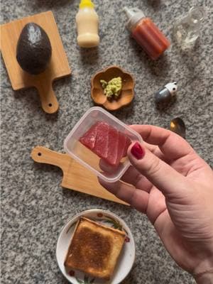 🐟 tuna tartare for tiny toastie tuesday 🐟 a tiny bit of tuna and a itty bitty avocado (i found @ hole foods) cut into a flower shape bc i was feeling fancy 🌼 tuna chopped finely, kewpie mayo, a squirt of sriracha, a drop or two of soy sauce, and a lil wasabi topped avocado, a smidge of furikake, & a sprinkle of maldon 🙂‍↕️🤌 ✨ #toast #toasttuesday #tuna #tunatartare #🐟 #tartare #minifood #toastie #furikake #avocado #avocadotoast #🥑 #fyp #🌼