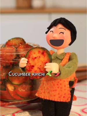 Tiny Grandma makes Cucumber Kimchi 🥒🌶️ recipe below! Halmi’s favorite treat. #kimchi   • Slice 8 cucumbers; salt & for 15 mins, Drain • Mix with 2 grated garlic cloves, 1 tsp grated ginger, 1/4 grated onion, 2 tbsp gochugaru, 1 tbsp fish sauce, chopped green onions, sesame seeds • shake together, ferment 24 hours.  • Enjoy! #korea #FoodTok #koreanfood #레시피 #먹방asmr #다이어트식단 #초콜릿 #cafe #맛집추천 #kfood #foodtiktok #일본여행 #eatingshow #food #nomnom #pickles #tinygrandma #stopmotion #animation 