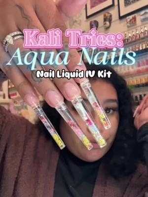 Kali Tries: AQUA NAILS 💧💧 I got my hands on @the_nailology_lab New Liquid IV Kit from @NAILDOC  Overall the kit is beginner friendly I would recommend!! Only feedback is the saline bottle did start to hurt my hand from squeezing to come out but that’s about it!! And if you do get the kit GET A NAIL ART SPOON!! lol  #aquanails #nailtutorial #explorenails #nailvlog #lanails #kalitries #liquidnails #waterglobenails #aliciathenaildoctor #sailormoonnails #valentinenails 