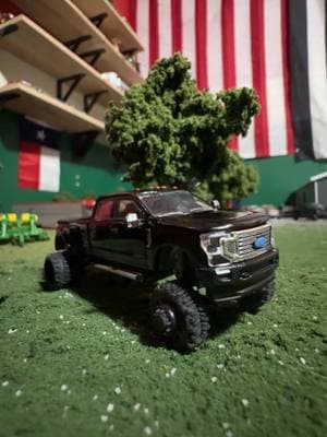 Truck rolling in the dirt #foryoupage #fypシ゚viral #164scalediecast #fordtruck #f350platinum #164models #liftedtruck #customtruck #MNtrucks #countrymusic 