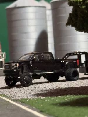 Black match trailer 🤤 #foryoupage #fypシ゚viral #164scalediecast #fordtruck #f350platinum #goosenecktrailer #fifthwheeltrailer #164models #liftedtruck #customtruck #MNtrucks 