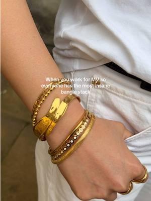 No shortage of a good stack here at the MV office.  #monicavinader #bangles #braceletstack #wriststack #officetok #officelife #officestyle #outfitinspo 