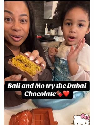 It’s Bali covering her ears as Mo was breaking it in half😂❤️ #trending #explorepage #balireign #dubaichocolate 