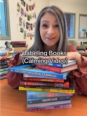 Slowing it down. Label books with me. #library #book #label #librariansoftiktok #teacher #librarian #processvideo #process #bookish #task #calming #breathe #quiet #comfort #satisfyingvideos #librarytok #librarytiktok #books 