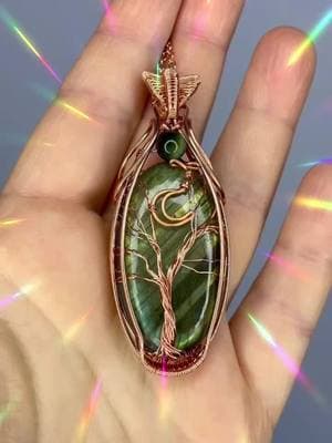 I have a beautiful green labradorite, and tigers eye pendant listed in my shop. Link on my bio. 🌙💚 #sollunaalchemy #handmadejewelry #handmade #wirewrappedjewelry #botanical #copperjewelry #wirewrap #wirewrappedcrystals #wirewrappedpendant #coppernecklace #treeoflife #labradoritejewelry #labradoritependant #tigerseye #moonjewelry #moonandstars 