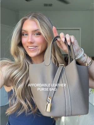 the cutest handbag oh my my this is a get it while you can purse because I’ve seen it all over my FYP and the quality is actually so nice 👏 definitely a great staple that has a fun shape comes in a couple colors too!! #handbag #purse #handbags #handbagtiktok #handbagcollection #affordablepurses #bucketbag #leatherpurse #leatherbag 